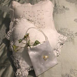 Lovely Accent Pillows and Bag for a beautiful made up bed